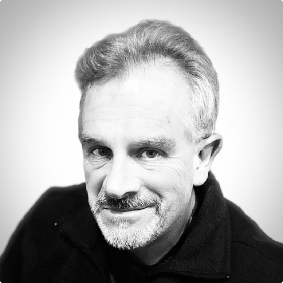 black and white image of Jeffrey Hallett author and owner